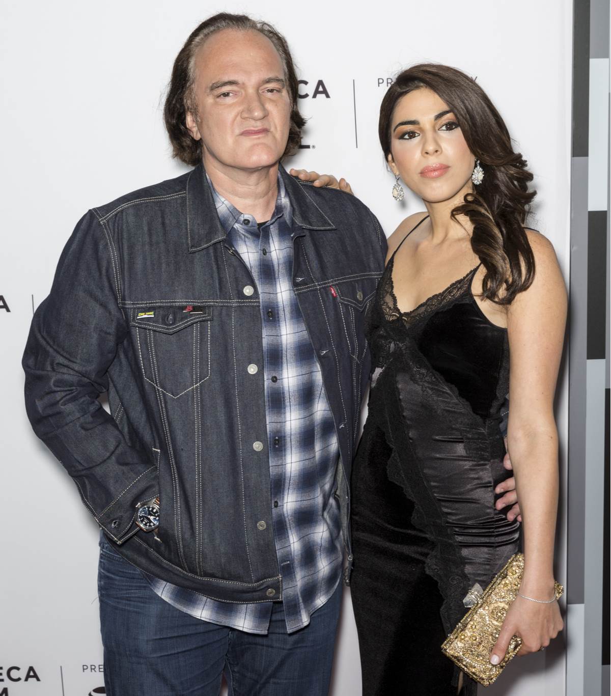  Kventin Tarantino sa ženom sa kojom ima sina Lea. 