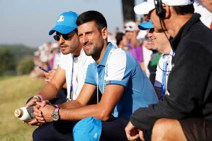 Novak sa Markom na golf meču.